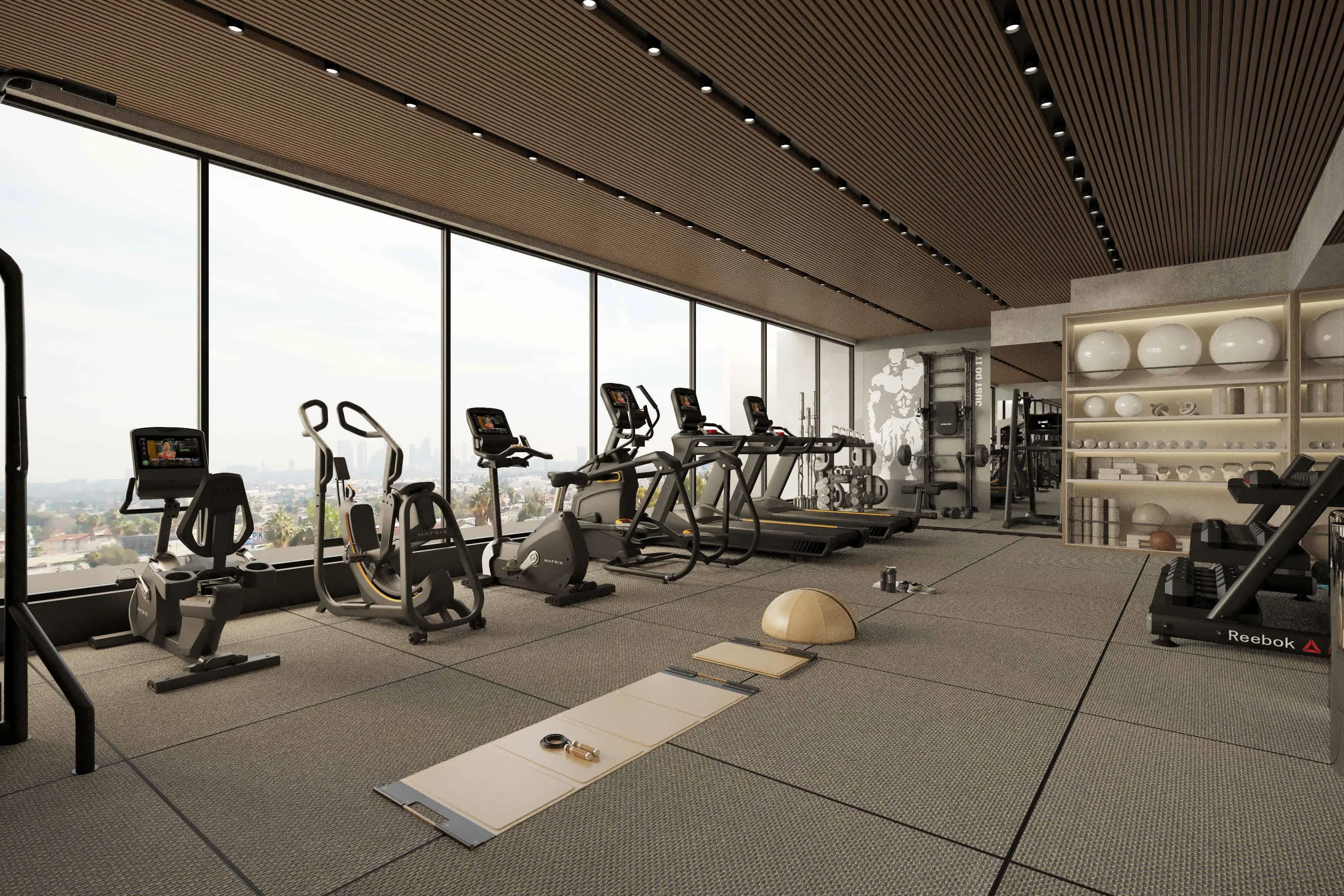 Azra Residence amenity Gymnasium - Dubai Land Residence Complex, Dubai - by Enaam Properties Development