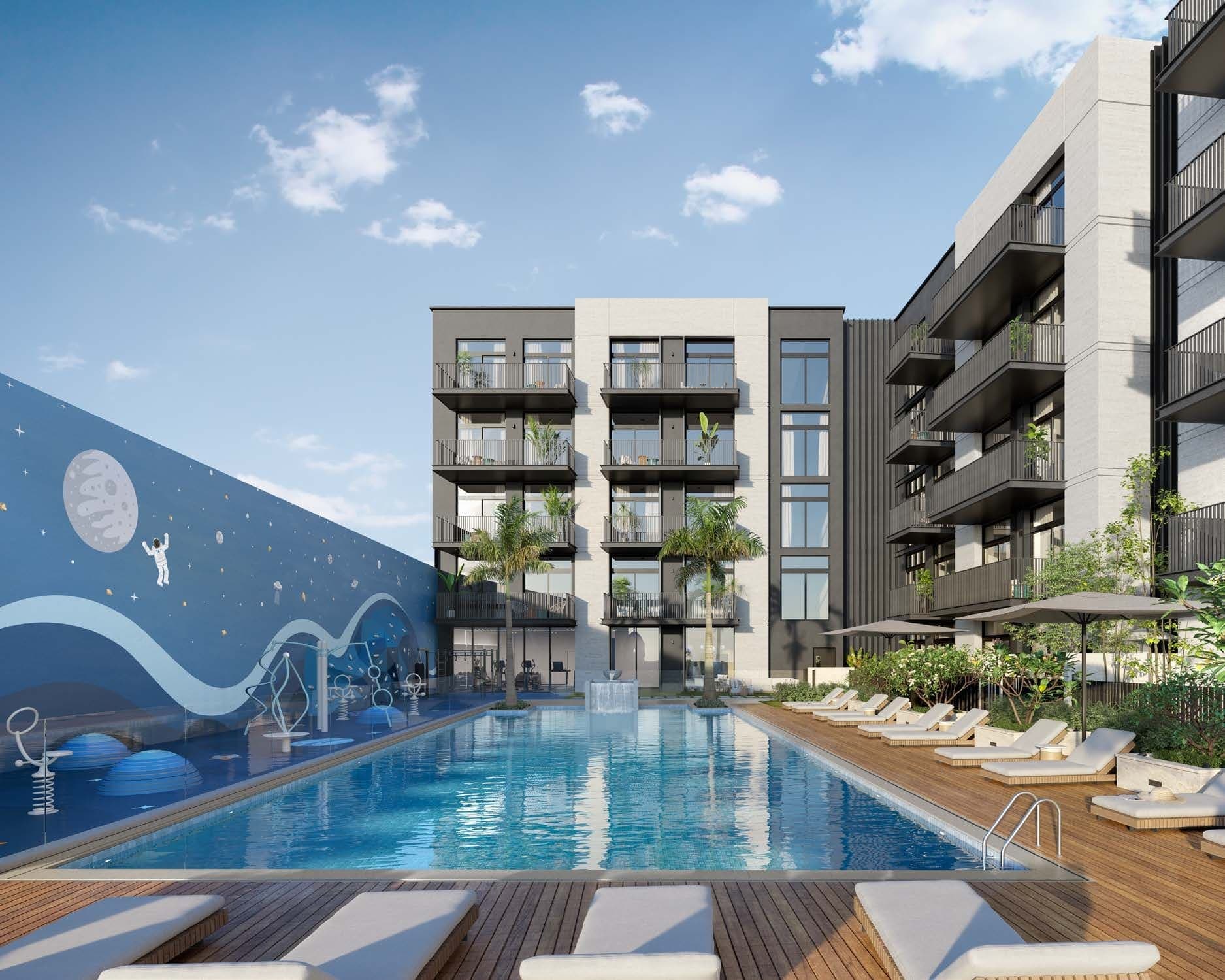 Belmont Residences amenity Lap Pool With Sun Loungers in JVT (Jumeirah Village Triangle), Dubai, by Ellington