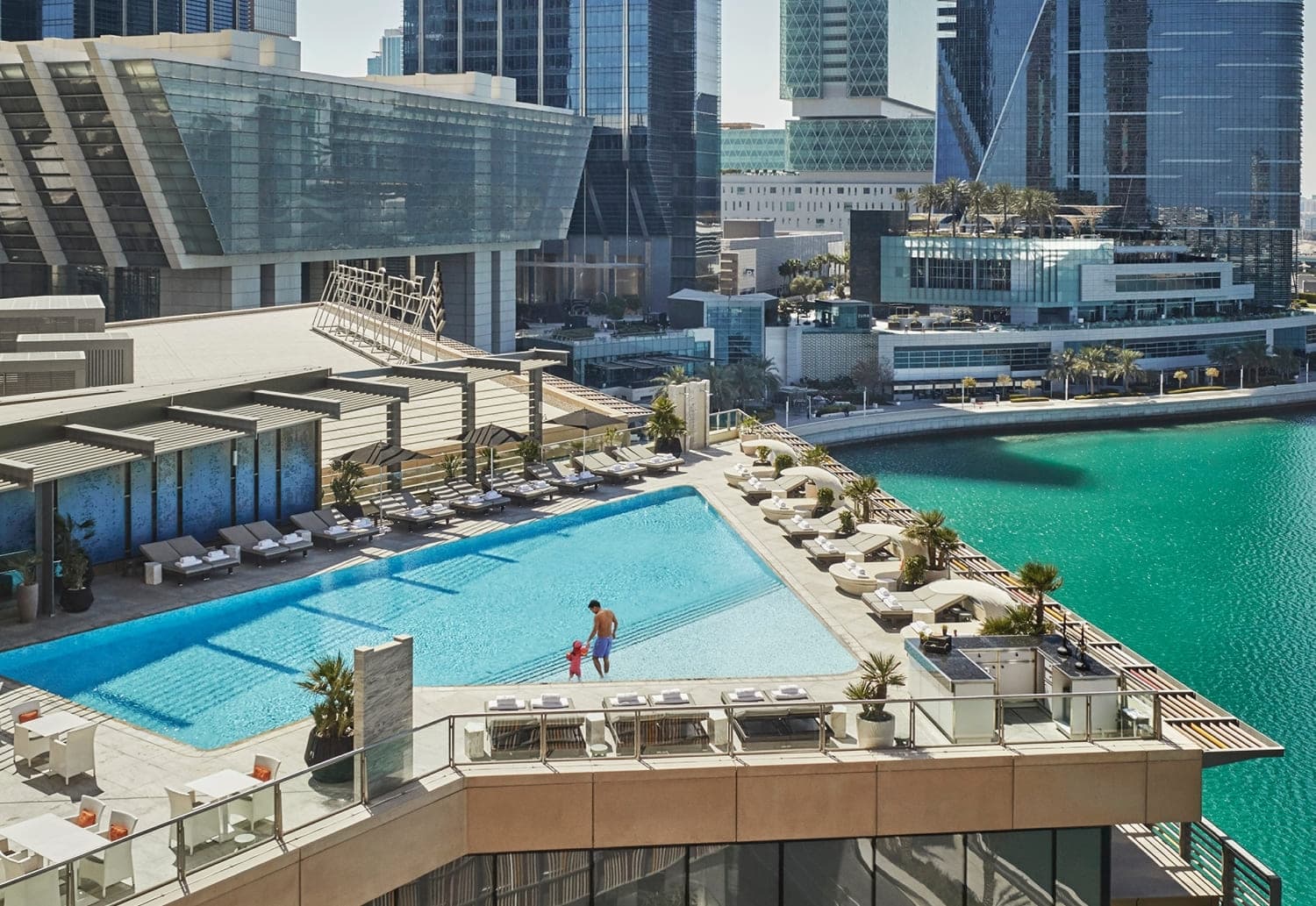 Four Seasons Private Residences Abu Dhabi at At Al Maryah Island amenity Pool Area - Al Maryah Island, Dubai - by Mubadala