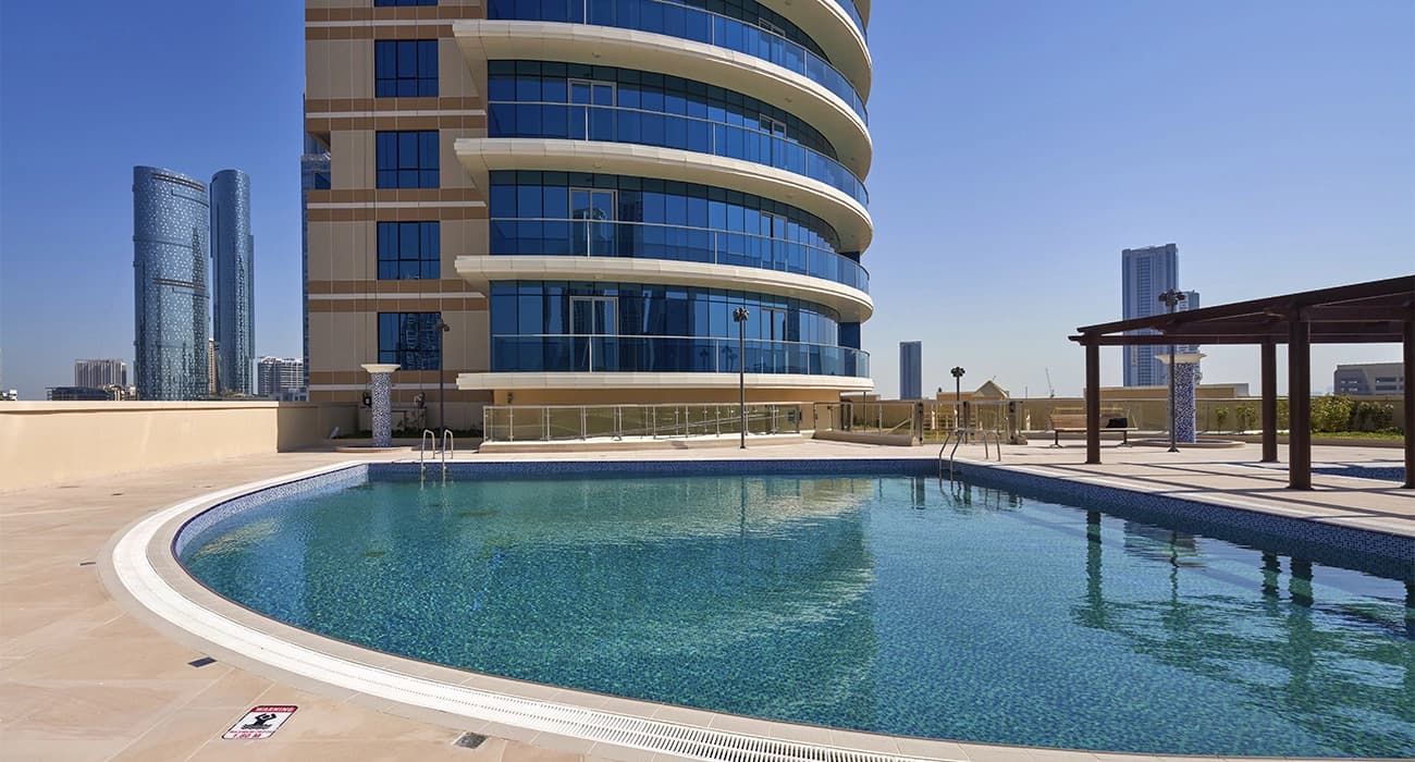 Julphar Residence amenity Swimming Pool - Abu Dhabi, Dubai - by RAK Properties