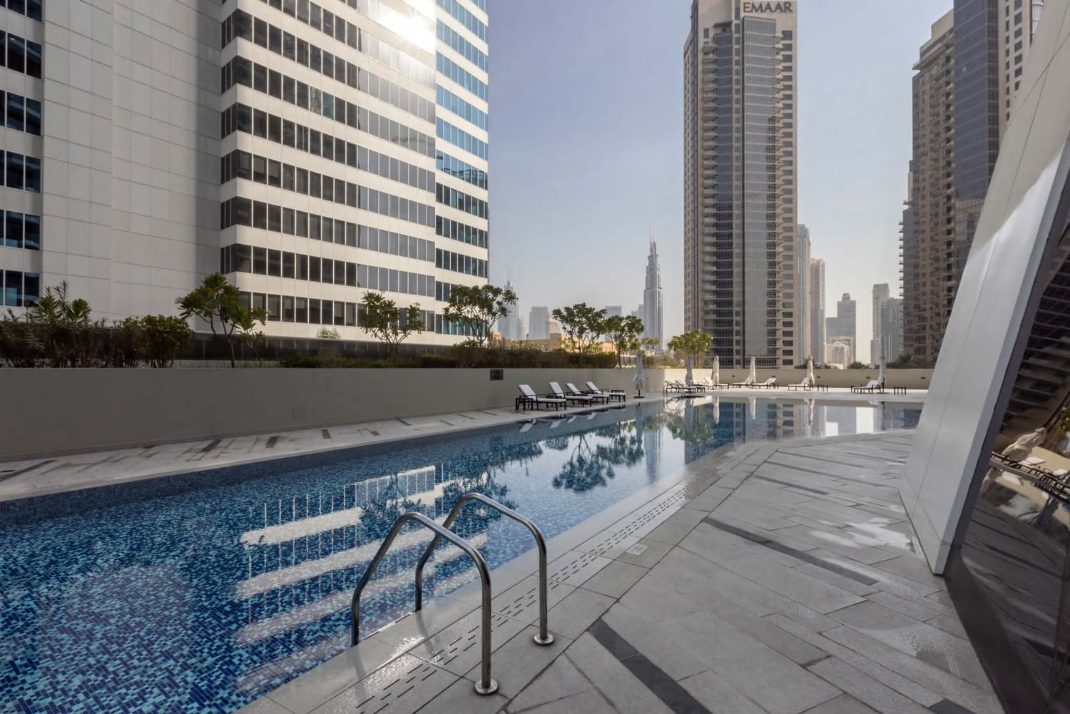Marquise Square amenity Podium-Level Swimming Pool With Children’S Pool in Business Bay, Dubai, by Seven Tides