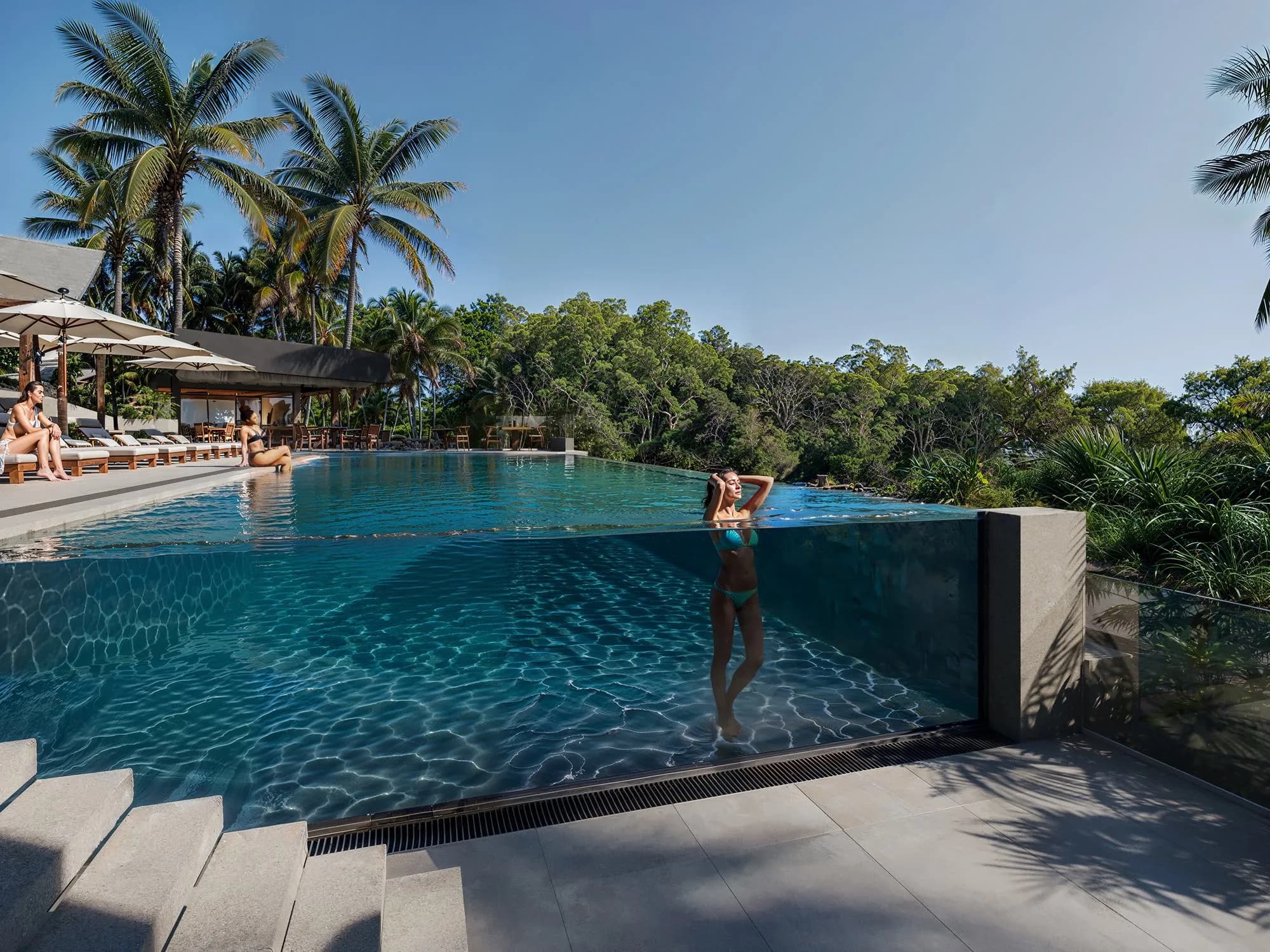 Moon Rock Villas amenity Infinity Pool with Glass Wall - Gianyar, Dubai - by Big Waves Development