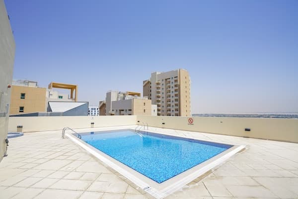 Oakwood Residency amenity Roof Top Swimming Pool - Dubai Production City, Dubai - by Deyaar